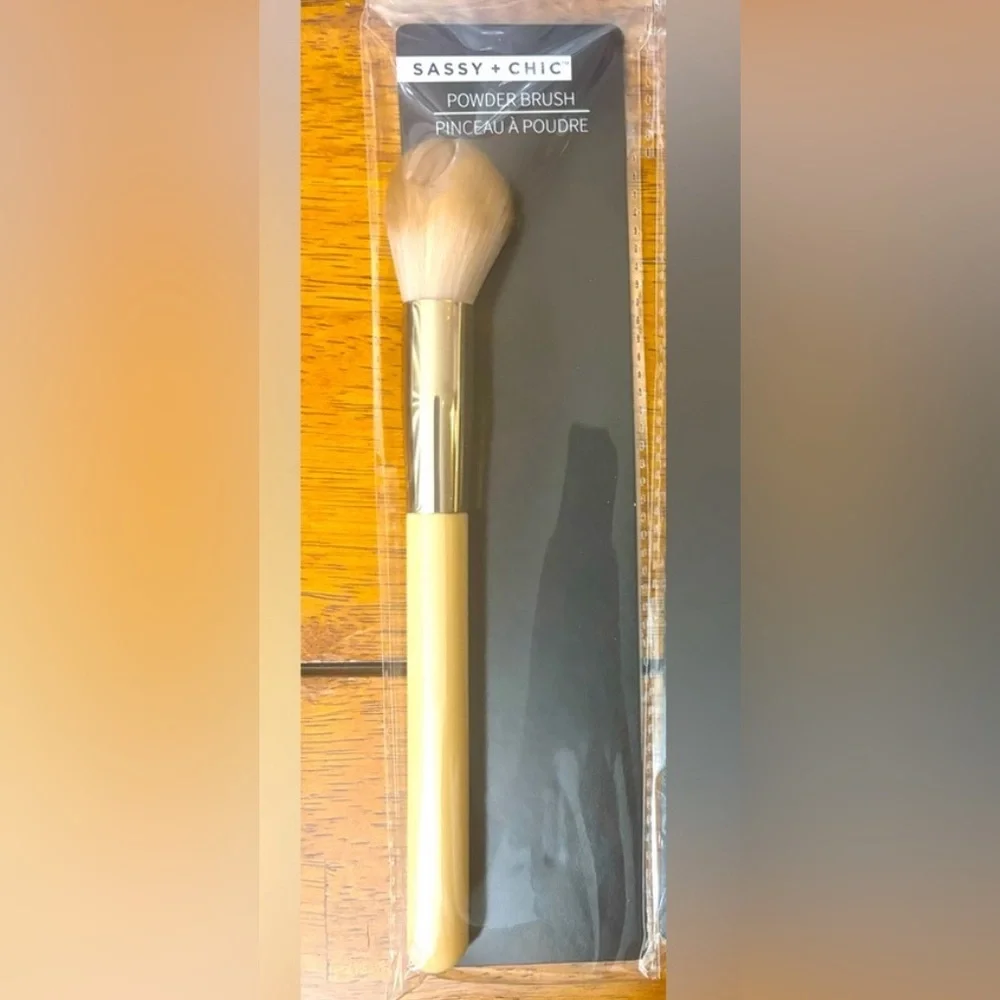 3 Bundled Brushes: Foundation, Blush, & Angled Concealer brushes.
